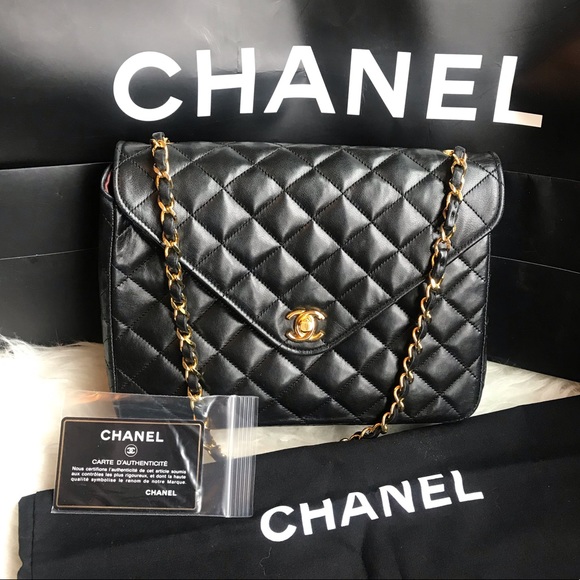 CHANEL Handbags - Authentic CHANEL black round Lambskin